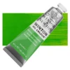 A tube of Phthalo Yellow Green Winsor and Newton Winton Oil Paint 37ml is shown diagonally, across the center of the frame. The tube is a silver colour and has a white screw on, plastic lid. The Winsor and Newton logo is printed at the top of the tube and there is a white band printed across the tube, below the logo, that has the words 'Winton Oil Colour' written on it. Below that is a colour band printed across the tube that has black text describing the product colour and paint properties. There is a rectangular colour swatch behind the tube that shows the colour of the paint. It lays horizontally across the top third of the frame. The image is center of the frame and on a white background.