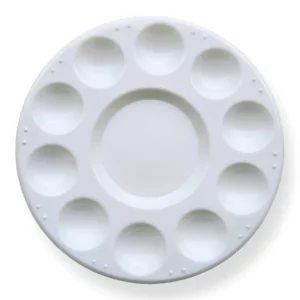 A single Prime Art Plastic Palette 10 Well Round is shown in the center of the frame. The palette is round and made of white plastic and has 10 round wells to hold colour. The image is center of the frame and on a white background.