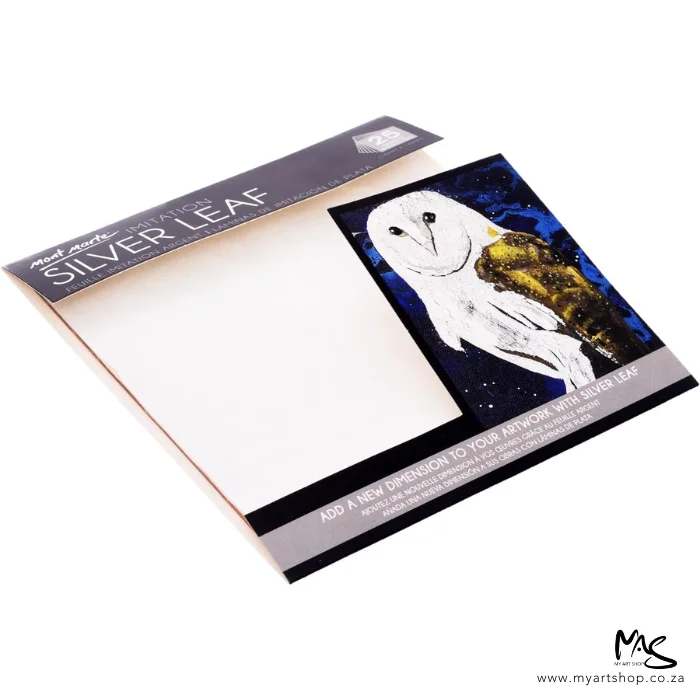 mont-marte-imitation-silver-leaf-02 A pack of Mont Marte Imitation Silver Leaf can be seen in the center of the frame. The leaf is provided in a clear, hangable plastic packet. There is a piece of board at the front of the packet that contains an image of an owl and a description of the product and the brand name. The image is center of the frame and on a white background. The packet is laying diagonally across the frame.