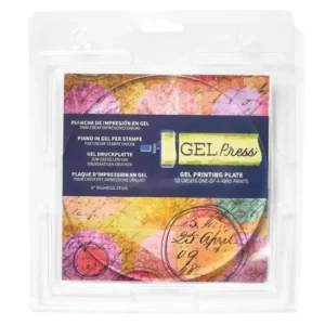 A 6" Round Gel Press Printing Plate is shown, in it's packaging, in the center of the frame. The packaging is a thick, clear plastic so you can see the plate through the packaging. The plate is translucent. There is a printed sheet under the plate that has the Gel Press logo printed on it, as well the plate size and other details. The image is center of the frame and on a white background.