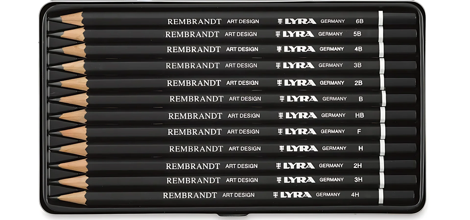 Lyra Rembrandt Sketching Essentials shows a tin of the lyra pencils. they are all lying horizontally in the tin. nibs facing the left side of the image. they are all black wood cased pencils with silver writing. their name is clearly visable on them. the tin is open and has an inside silver lid with a black plastic insert that the pencisl are sitting in.