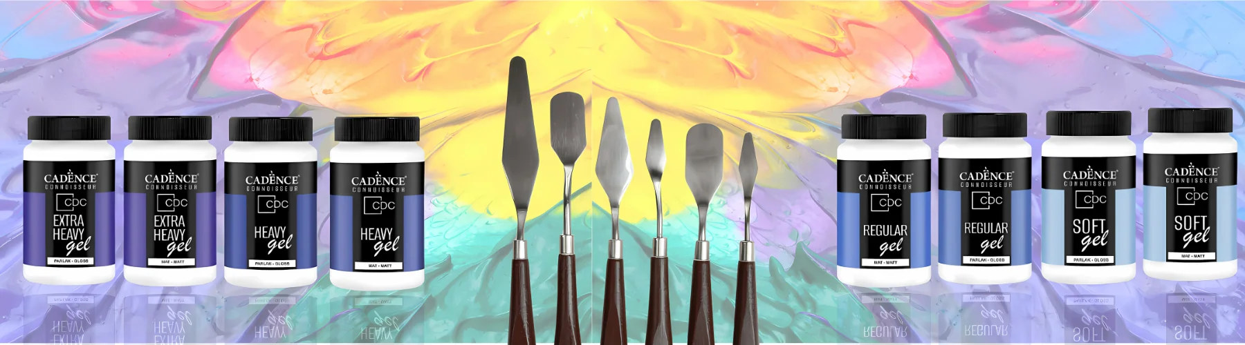 cadence-connoisseur-gel-mediums. on the left and right of the image are a group of the mediums all lined up. they have white tubs with blue labels and black writing with black lids. in the center is a set of 6 palette knives. they have brown wood handles and metal tips. they are sitting on a textured acrylic background in blue, purple, yellow and orange colours.