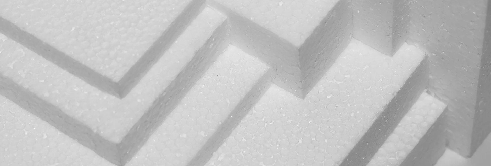 polystyrene-crafting-wonders. the image shows various sizes of polystyrene layered ontop of eachother. they are in block form and all stacked on eachother.